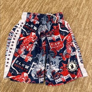 Flow Society football Graphic Shorts - Red, Blue, and White. Size youth xs.